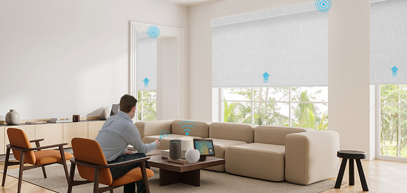 a modern living room with a focus on smart home technology and automated window treatments
