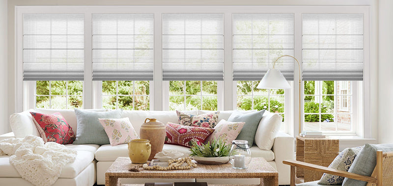 Roller shades offer a sleek, minimalist look and efficient light control, making them ideal for modern interiors. In contrast, roman shades provide a more formal and decorative appearance, perfect for traditional or elegant rooms.