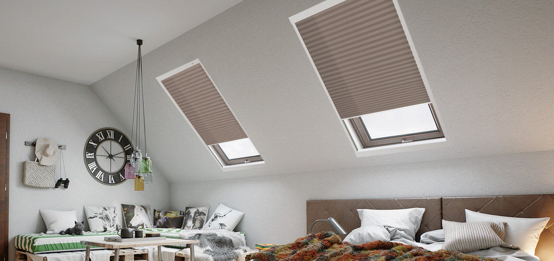 The window in the attic bedroom is fitted with a skylight shade