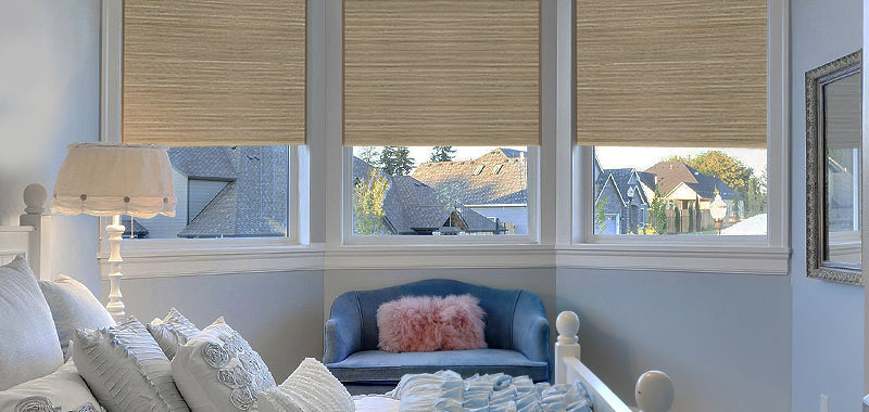 Woven wood shades inside bay windows