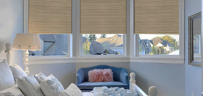 Woven wood shades inside bay windows