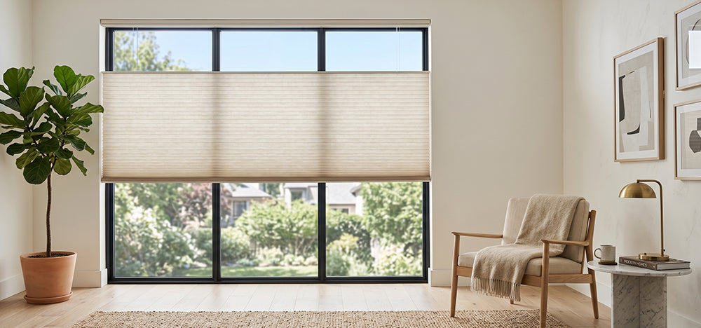 Motorized cellular shades installed in a modern living room, providing light control, privacy, and energy-efficient comfort.