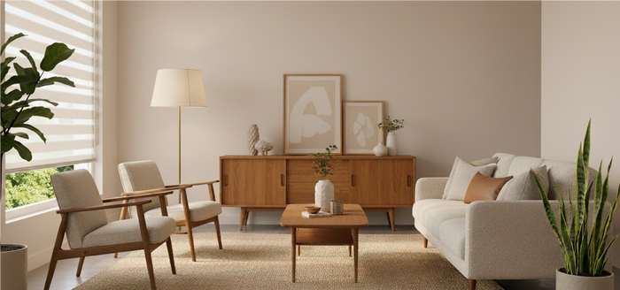 Gray textured smart roller shades with solar charging capability, controlled via voice commands in a cozy living room