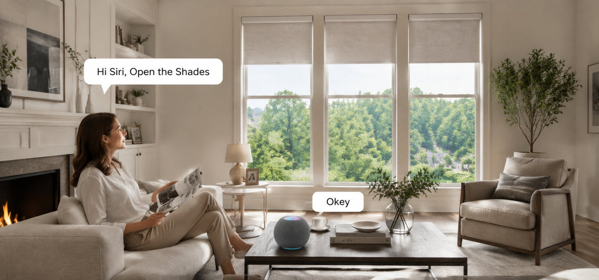 A woman relaxes in a cozy modern living room, using voice control to open motorized roller shades while enjoying a quiet moment with a magazine and coffee.