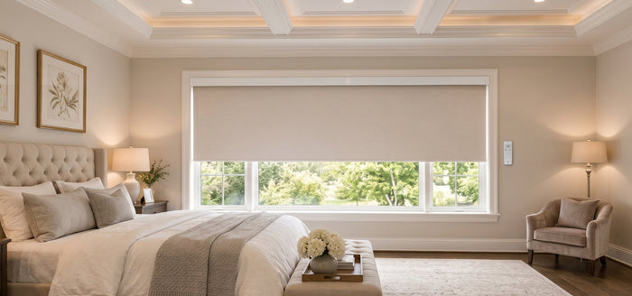 Modern bedroom with Motorized blackout roller shades for better insulation and sleep comfort.