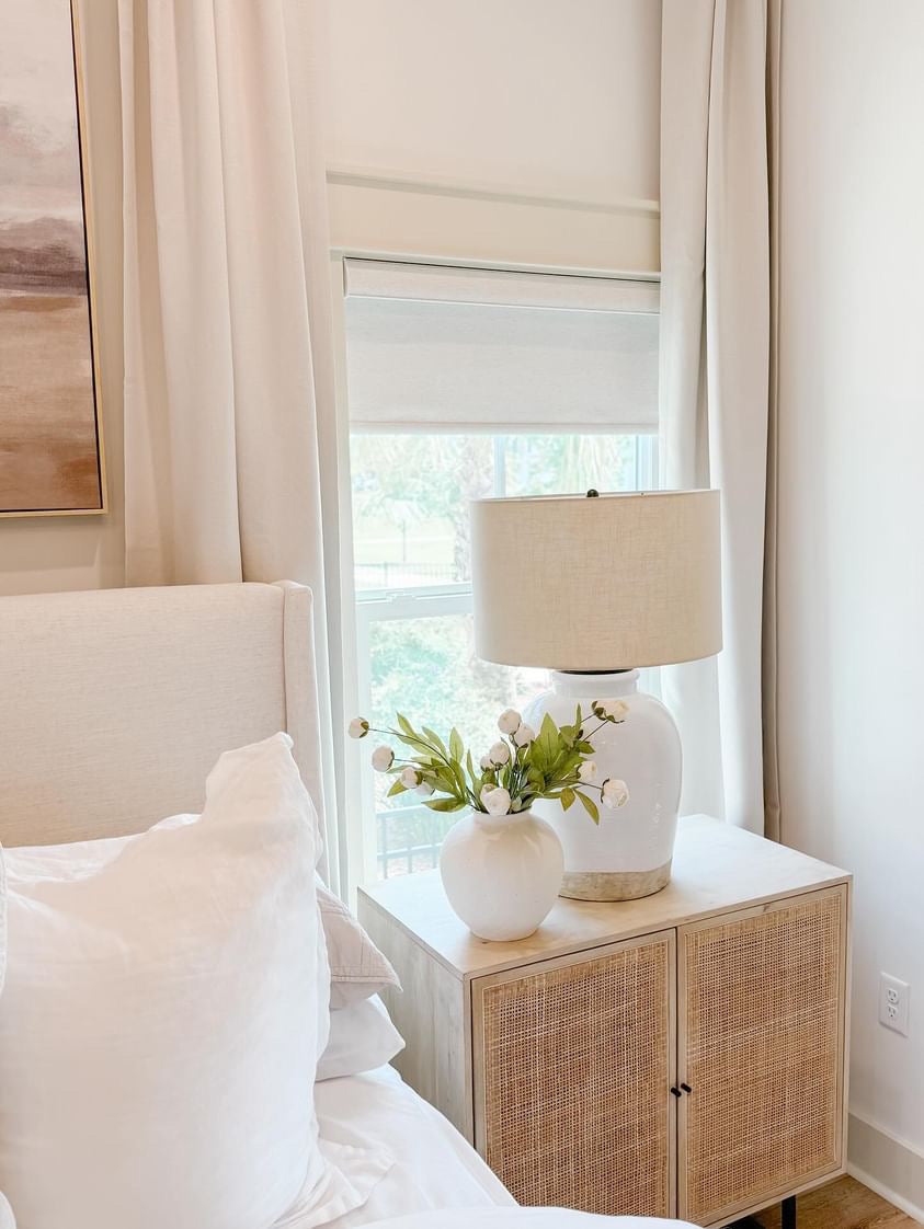 SmartWings roller shades installed in a modern living room