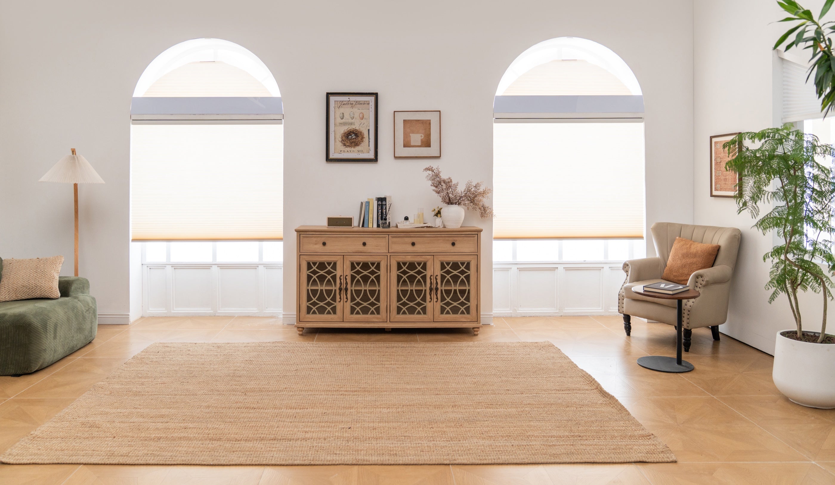Cellular shades fitted to two tall arched windows
